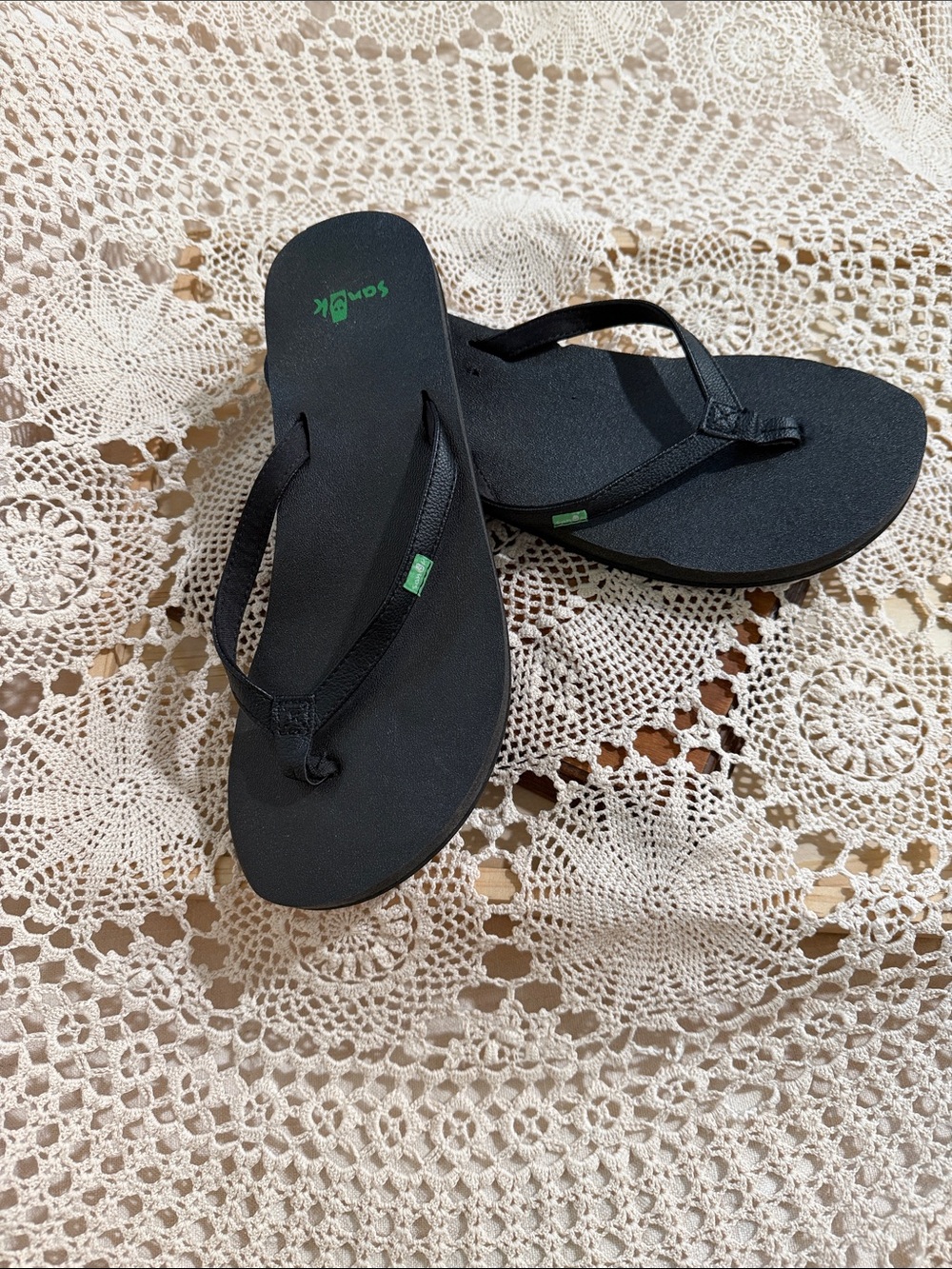 Sanuk Black Flip Flop Sandals with Green Logo Accent